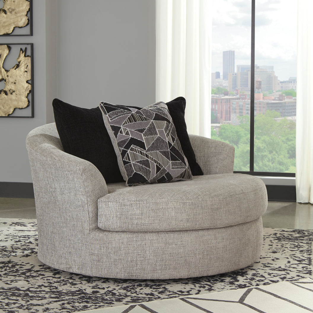 Fauteuil surdimensionné pivotant en tissu gris pâle avec coussins - Megginson