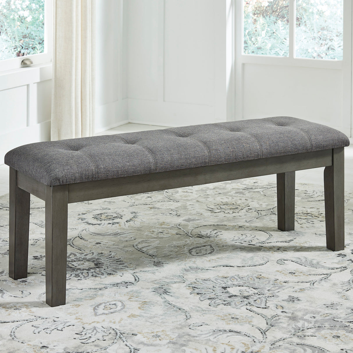 Banc de salle à manger rembourré en tissu gris capitonné - Hallanden