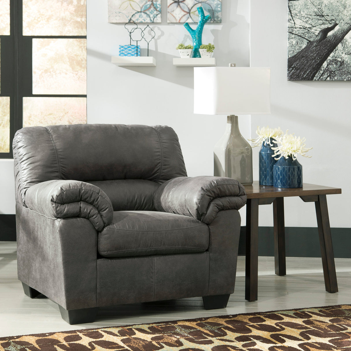 Fauteuil aspect cuir gris foncé - Bladen