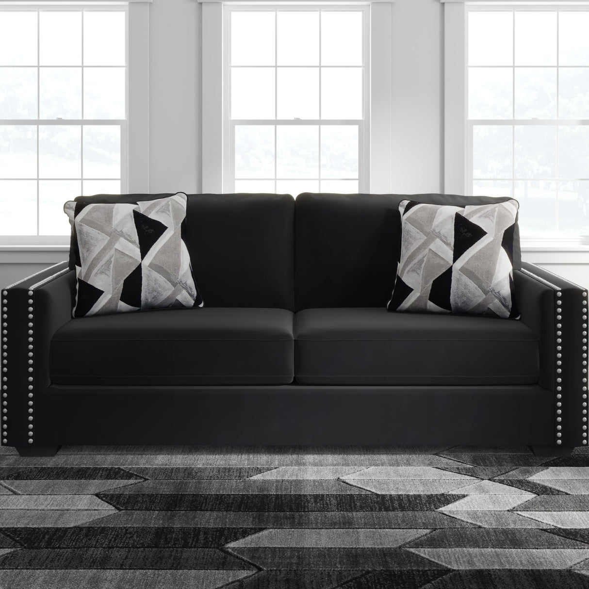 Sofa condo en tissu noir avec coussins - Gleston