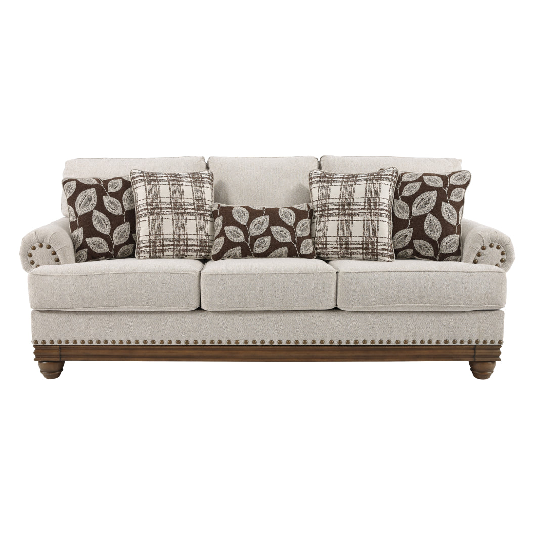 Sofa en tissu beige pâle avec coussins - Harleson