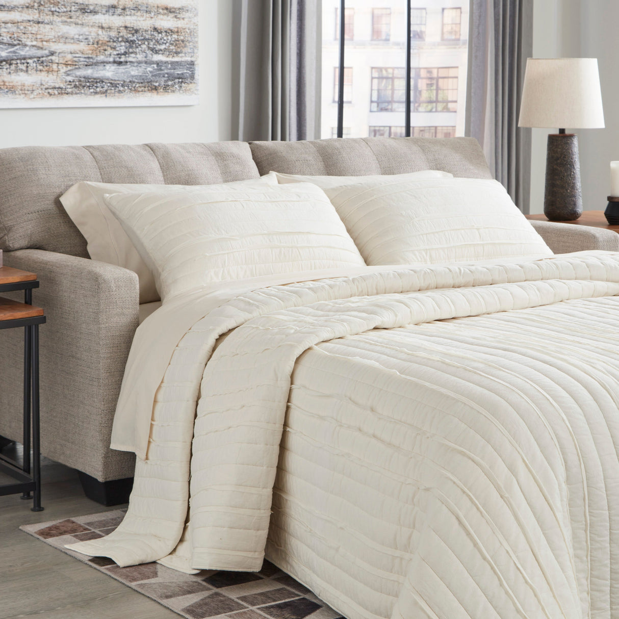 Sofa-lit en tissu gris pâle avec matelas double - Mahoney