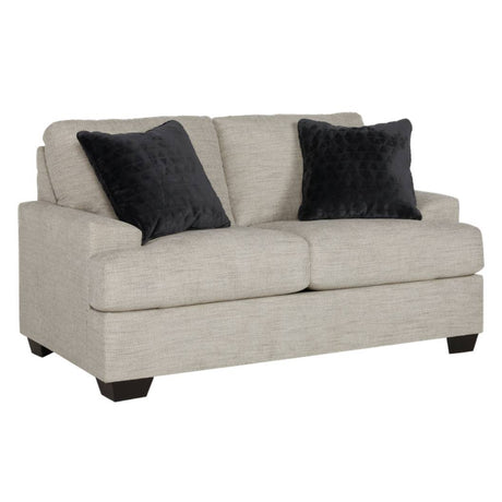 Causeuse en tissu beige pâle avec coussins - Vayda