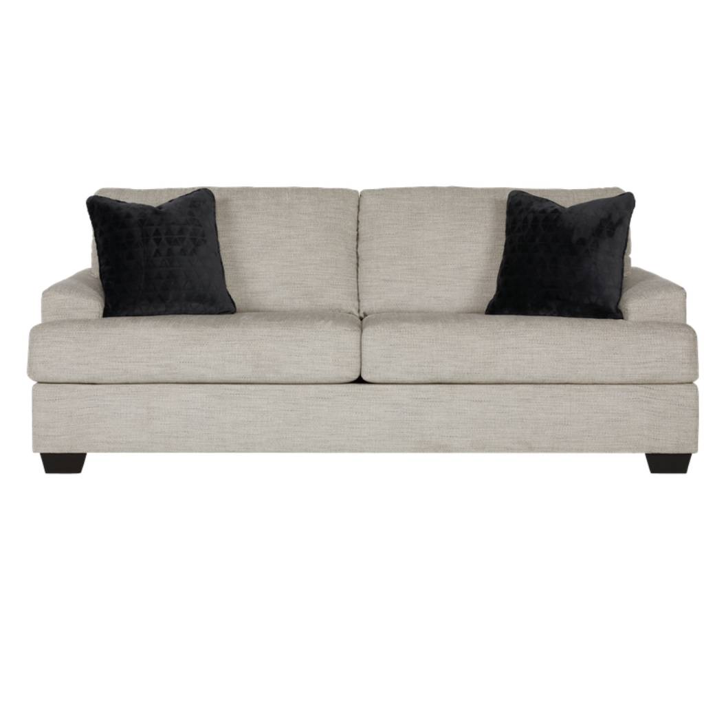 Sofa condo en tissu beige pâle avec coussins - Vayda