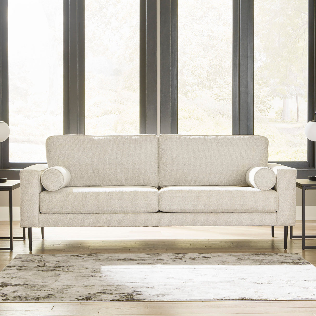 Sofa condo en tissu crème avec coussins - Hazela