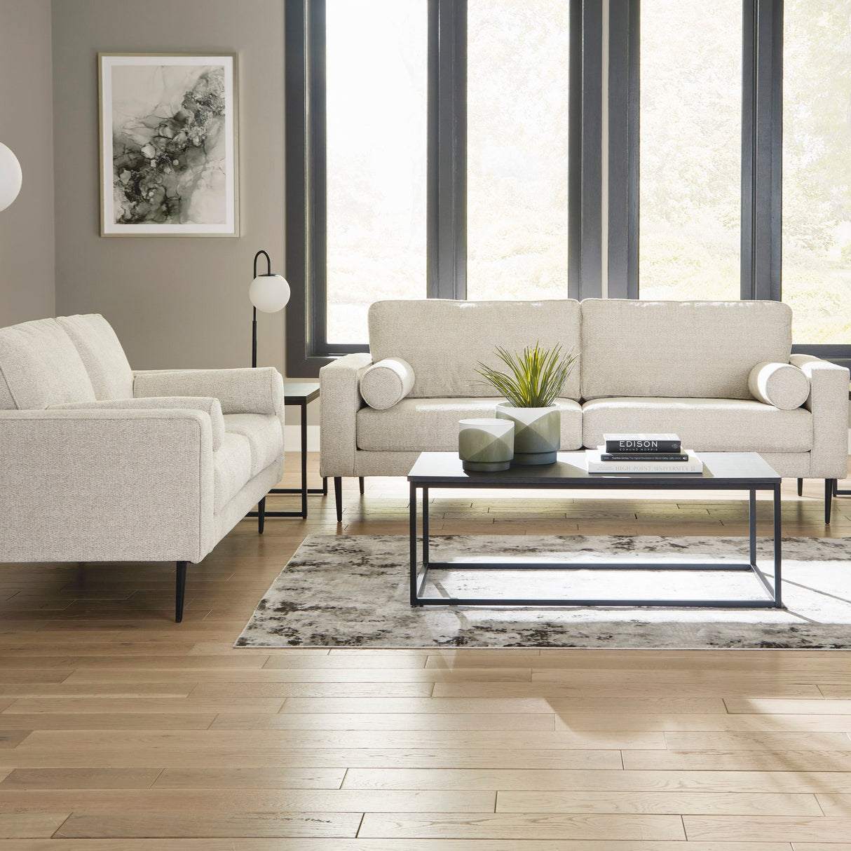 Sofa condo en tissu crème avec coussins - Hazela