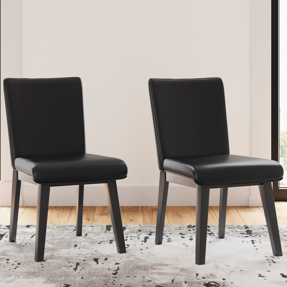 Ensemble de 2 chaises de salle à manger rembourrées aspect cuir noir - Jettaya