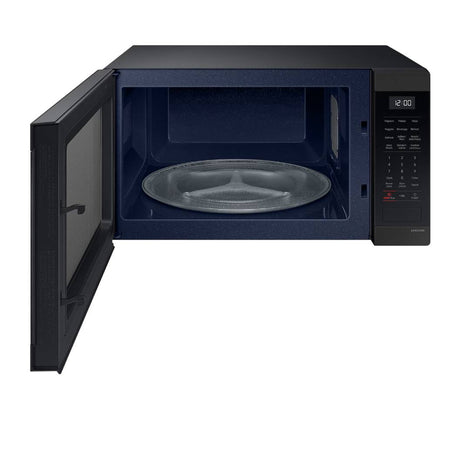 Micro-ondes de comptoir avec cuisson par capteur 1,9 pi³ 24 po noir mat