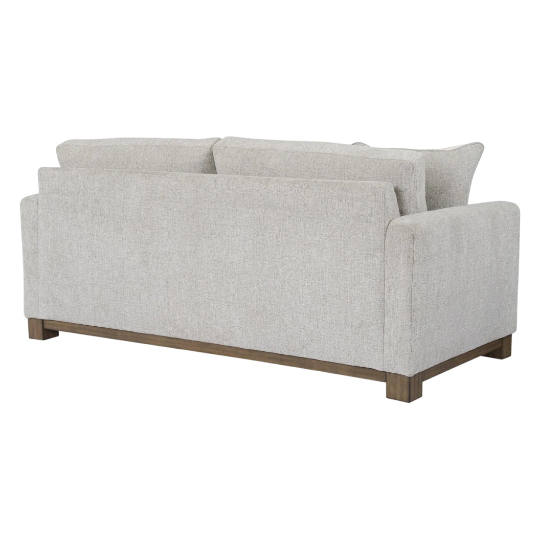 Sofa condo en tissu gris pâle avec coussins - MarinaMae
