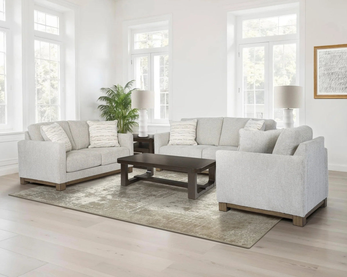 Sofa condo en tissu gris pâle avec coussins - MarinaMae