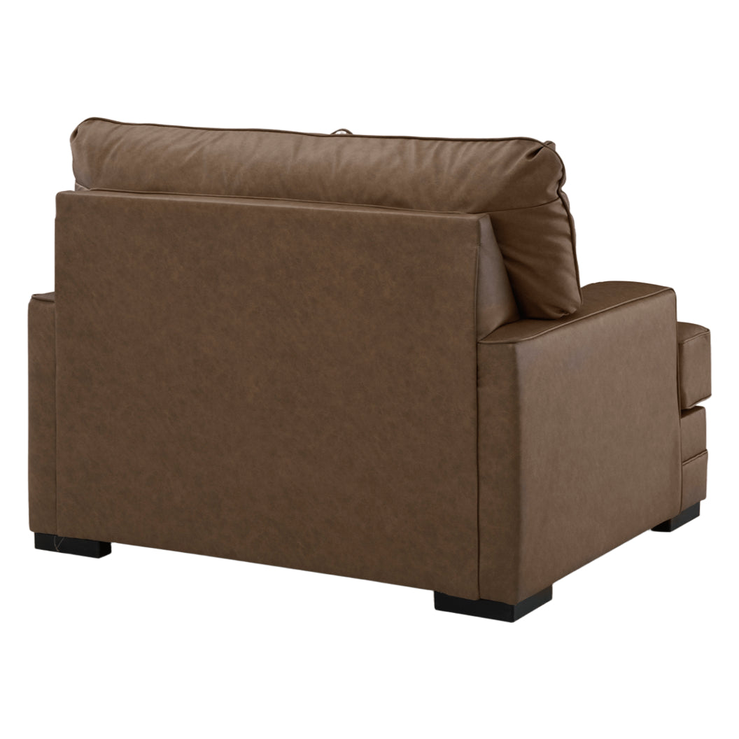 Fauteuil aspect cuir brun caramel avec coussin - VillaCourt