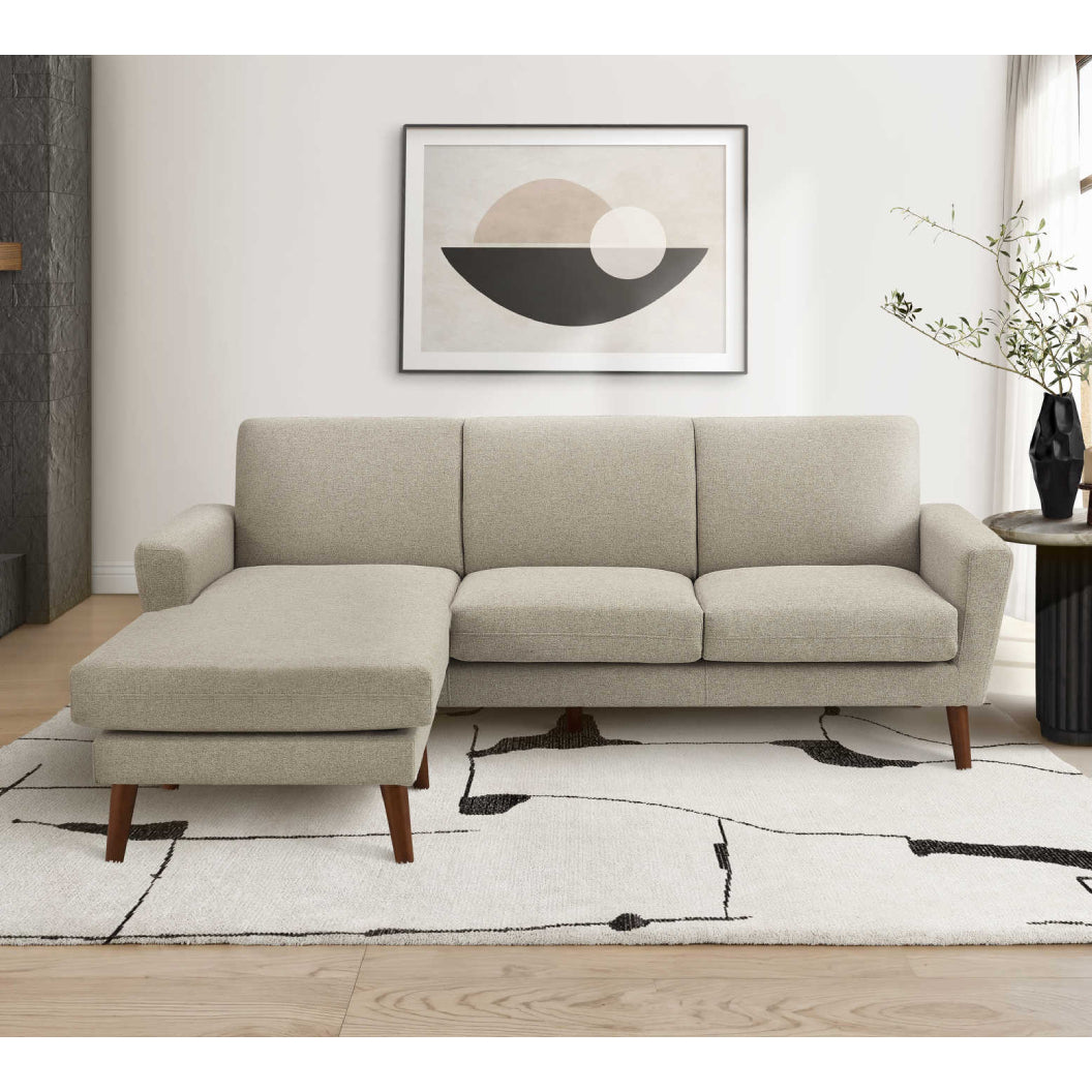 Sofa en tissu brun clair avec chaise longue