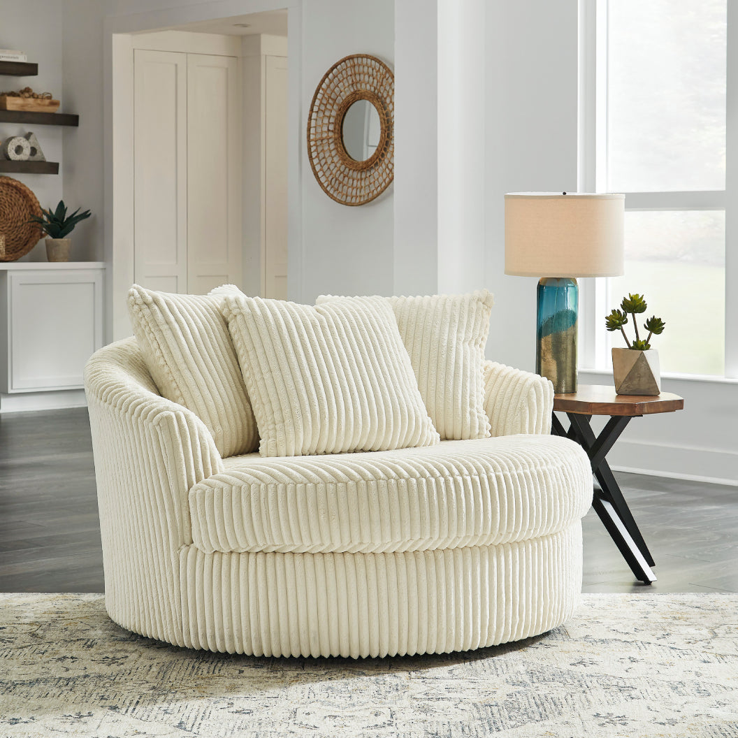 Fauteuil pivotant surdimensionné en tissu avec coussins - Lindyn