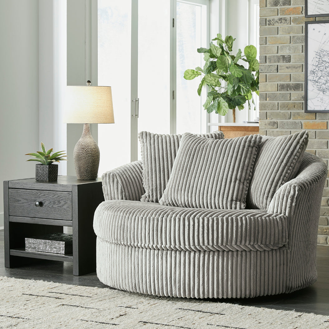 Fauteuil pivotant surdimensionné en tissu avec coussins - Lindyn