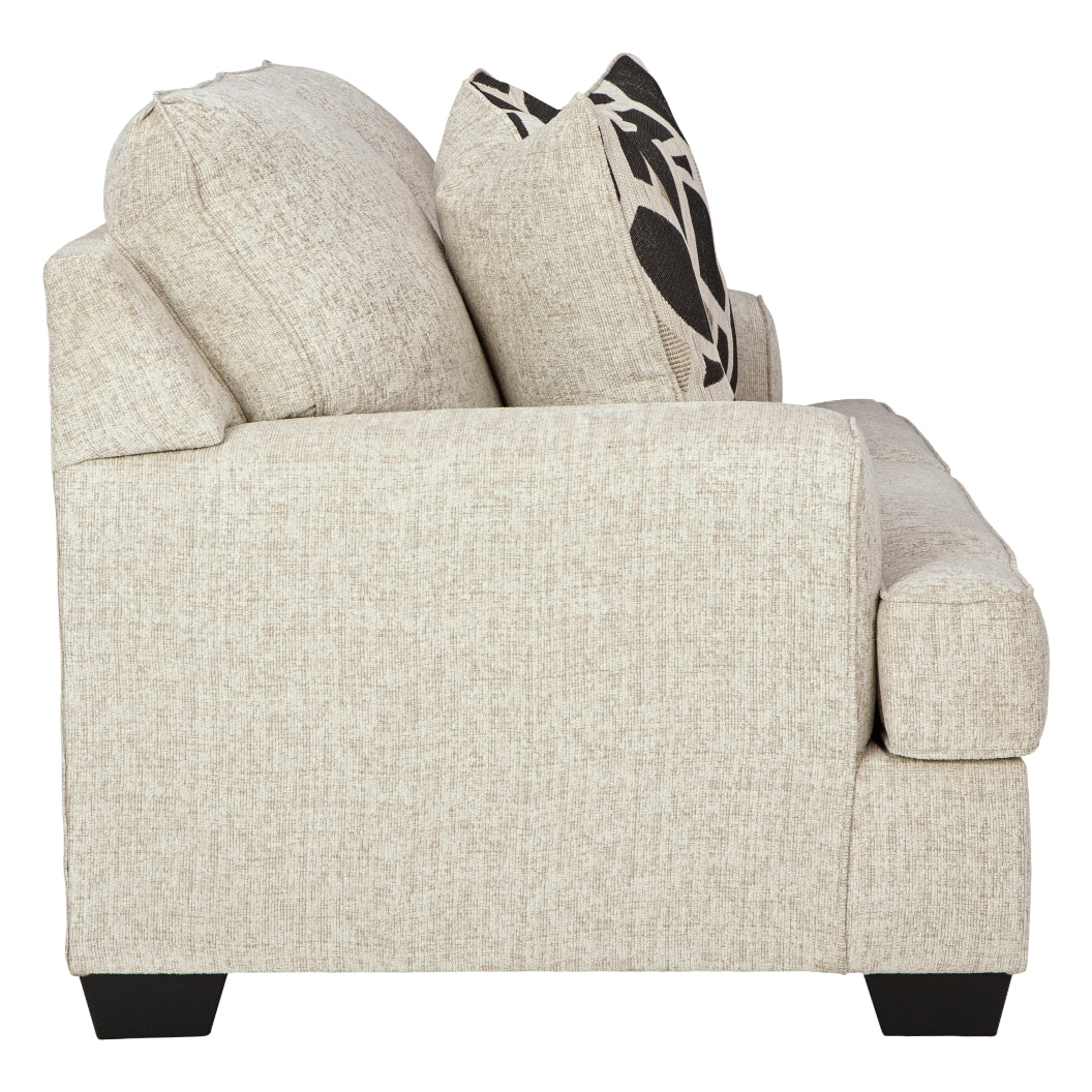 Causeuse en tissu beige pâle avec coussins - Heartcort