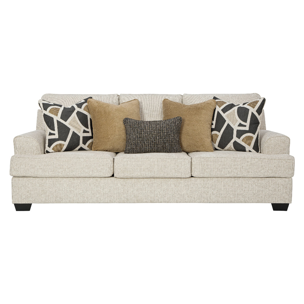 Sofa en tissu beige pâle avec coussins - Heartcort