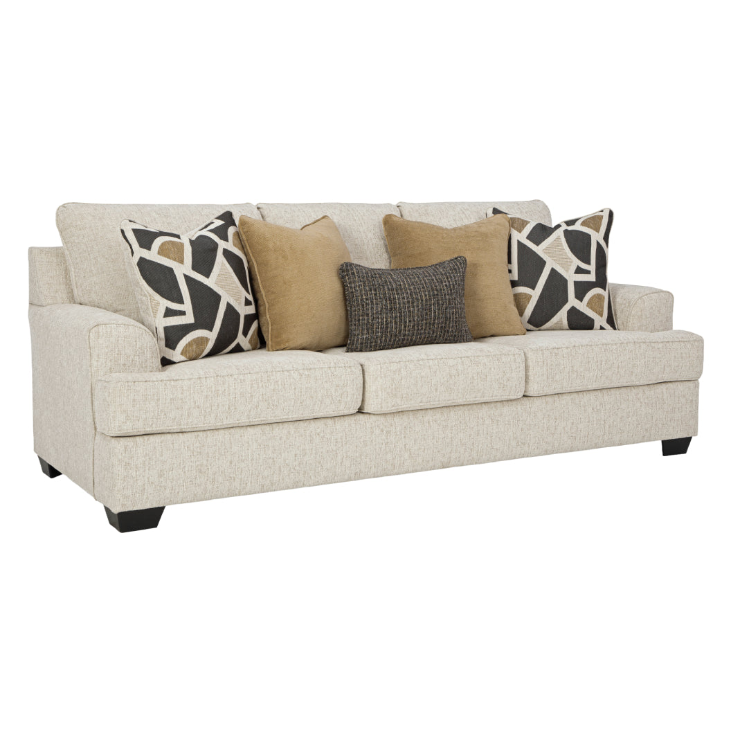 Sofa en tissu beige pâle avec coussins - Heartcort