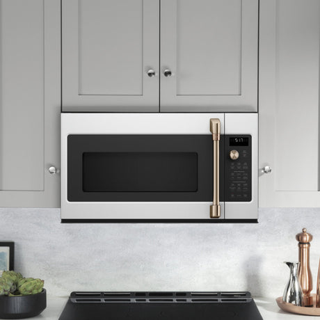 Micro-ondes à hotte intégrée 30 po, 1,7 pi³ Blanc mat avec Convection et Cuisson à la vapeur