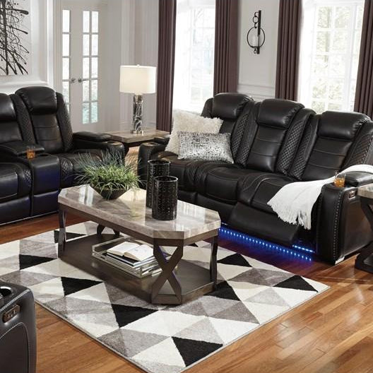 Sofa aspect cuir noir motorisé avec table rabattable - Party Time