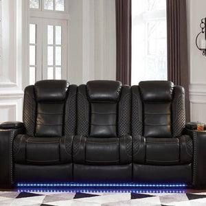 Sofa aspect cuir noir motorisé avec table rabattable - Party Time