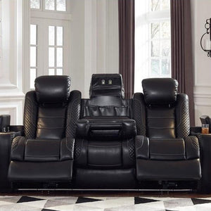 Sofa aspect cuir noir motorisé avec table rabattable - Party Time