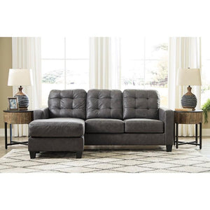 Sofa en aspect cuir gris foncé avec chaise longue - Venaldi