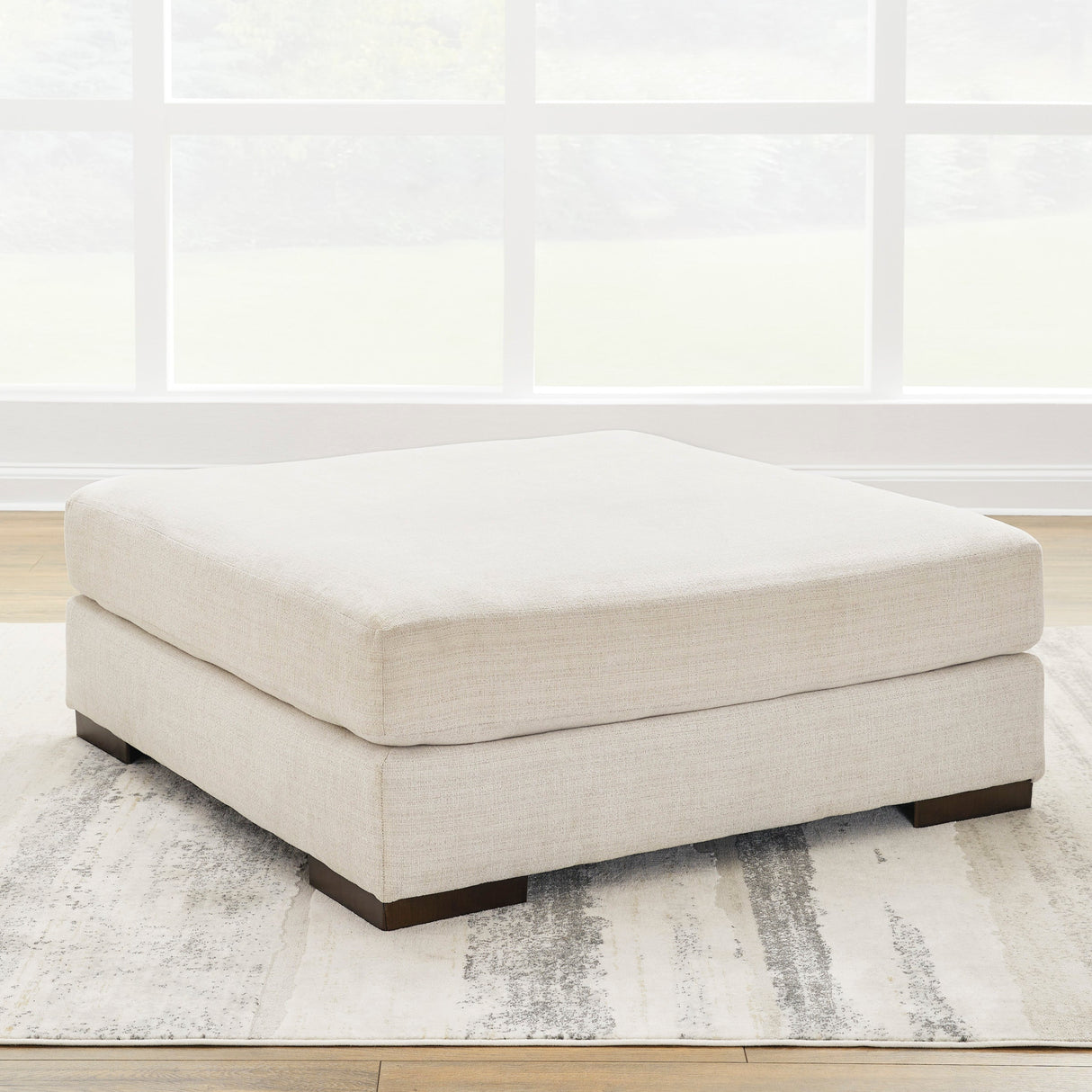 Ottoman surdimensionné Lyndeboro en tissu beige
