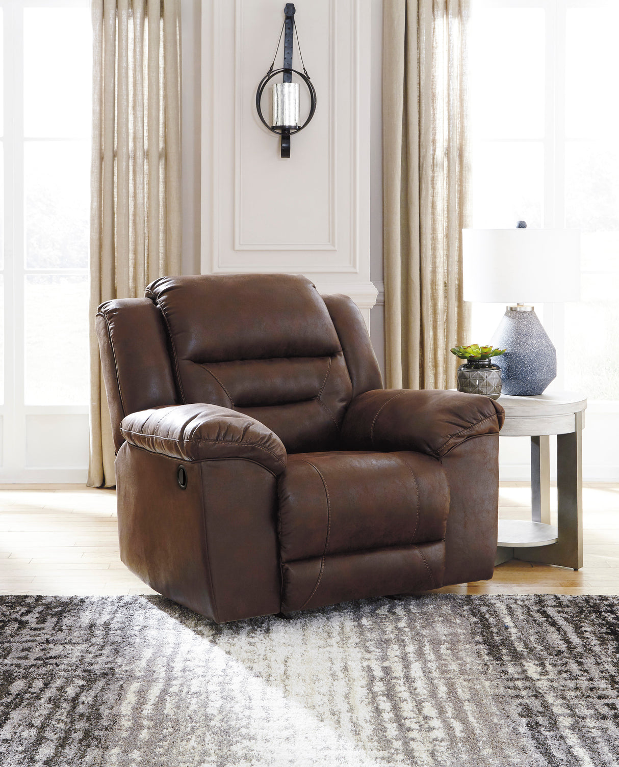 Fauteuil inclinable berçant aspect cuir chocolat