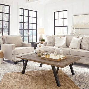 Fauteuil en tissu beige effet lin avec garniture cloutée - Claredon