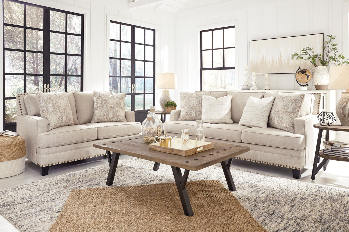 Sofa en tissu beige effet lin avec coussins - Claredon