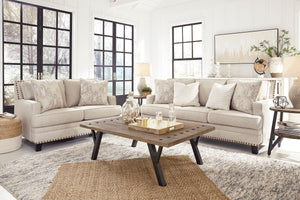 Sofa en tissu beige effet lin avec coussins - Claredon