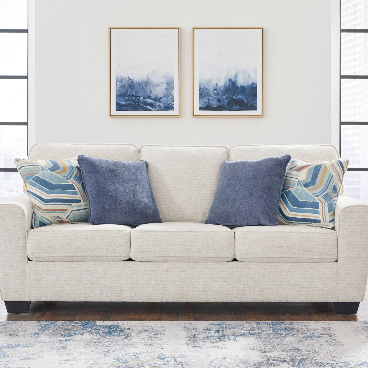Sofa en tissu blanc neige avec coussins - Cashton