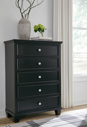 Commode à 5 tiroirs en bois et placage noir