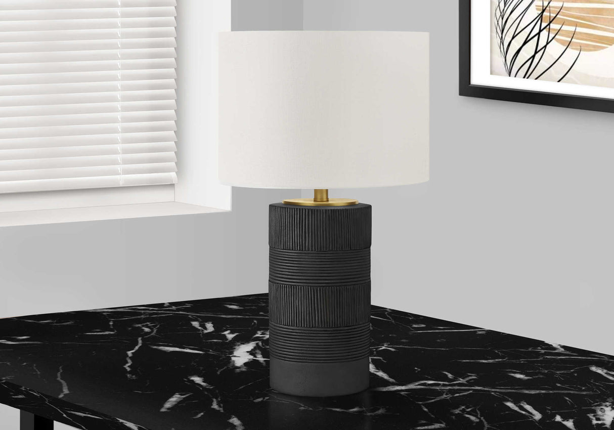Lampe de table en résine noire et dorée 24 po.