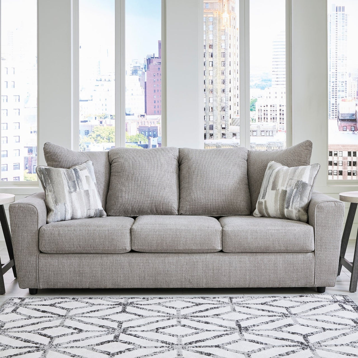 Sofa en tissu gris avec coussin - Stairatt
