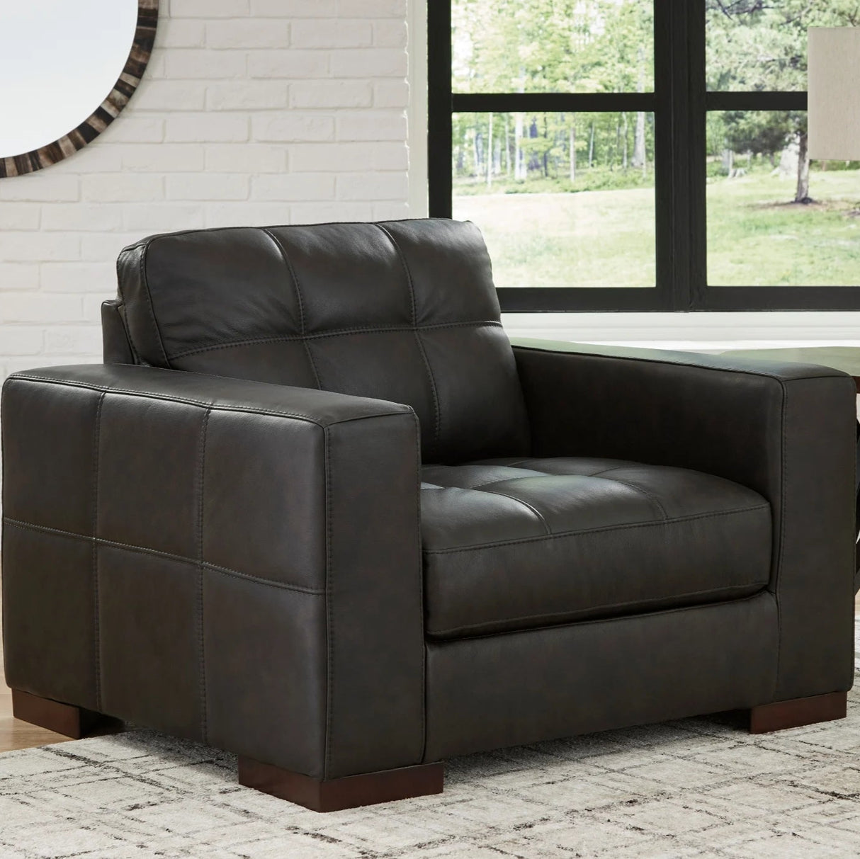 Fauteuil en cuir noir surdimensionné - Luigi
