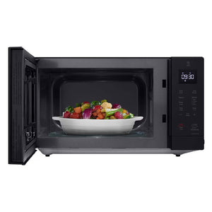 Micro-ondes de comptoir 20 po, 1,1 pi³ Noir