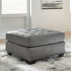 Ottoman aspect cuir gris surdimensionné - Clairette