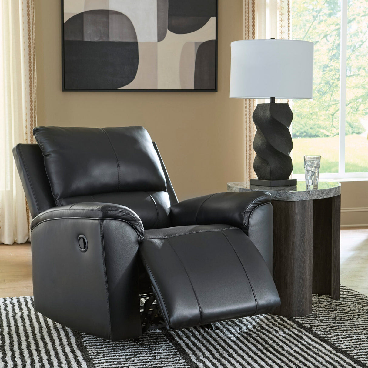 Fauteuil berçant et inclinable aspect cuir noir - Glossmore