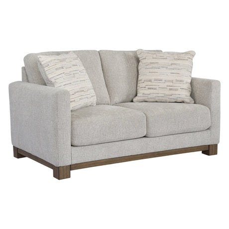 Causeuse en tissu gris pâle avec coussins - MarinaMae