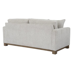 Sofa condo en tissu gris pâle avec coussins - MarinaMae