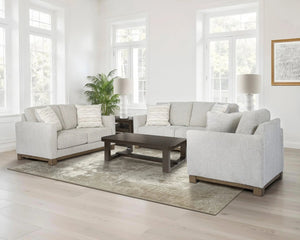 Sofa condo en tissu gris pâle avec coussins - MarinaMae