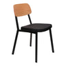 Chaise de salle à manger rembourrée aspect cuir noir et dossier en bois - Theo
