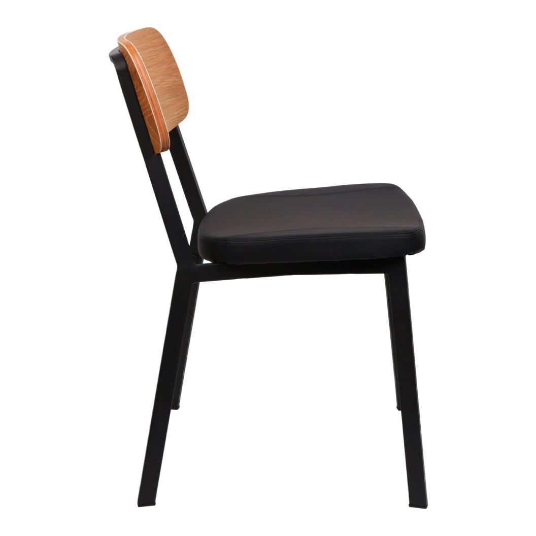 Chaise de salle à manger rembourrée aspect cuir noir et dossier en bois - Theo