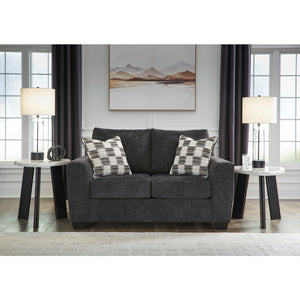 Causeuse en tissu noir ébène avec coussins - Loreo