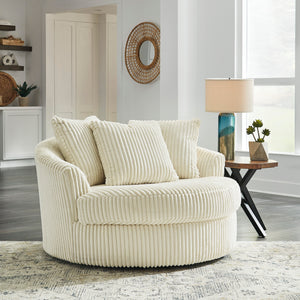 Fauteuil pivotant surdimensionné en tissu avec coussins - Lindyn