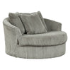 Fauteuil pivotant surdimensionné en tissu avec coussins - Lindyn
