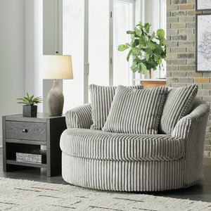 Fauteuil pivotant surdimensionné en tissu avec coussins - Lindyn