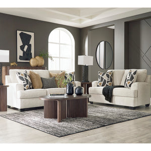 Causeuse en tissu beige pâle avec coussins - Heartcort