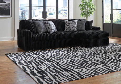 Sofa noir velours côtelé chaise longue à droite - Gabbyleigh